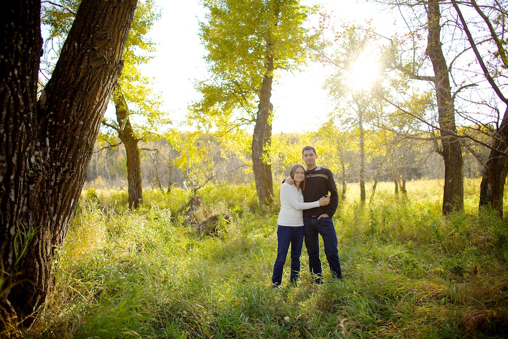Calgary wedding photographer | Engagement session | Fish Creek Park | Tall trees & sunlight setting sun