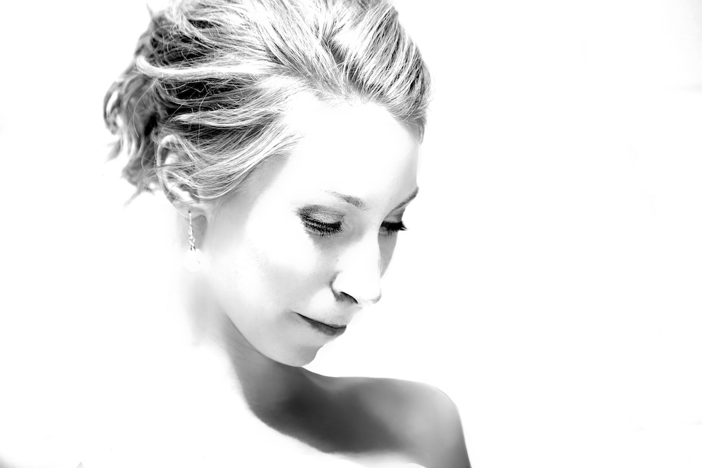 Calgary wedding photographer | Close up black and white picture of an attractive bride deep in thought