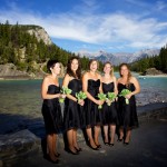 Banff Wedding Photographer | The Rimrock Hotel | Bridesmaids laughing in front of water and mountains