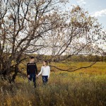 Calgary Wedding photography | Engagement photography | Fish Creek Park | Large sprawling tree Holding hands