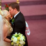 Calgary Wedding Photographer | Edmonton Vegreville wedding | bride and groom ceremony first kiss