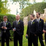 Calgary Wedding Photographer | Edmonton Vegreville wedding | groomsmen having a beer