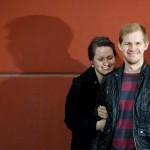Calgary Wedding photographer | Christine & Peter Engagement session | E-session orange wall cute snuggle