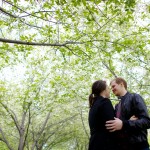 Calgary Wedding photographer | Christine & Peter Engagement session | E-session in the trees holding each other