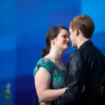 Calgary Wedding photographer | Christine & Peter Engagement session | E-session tight embrace in front of blue wall