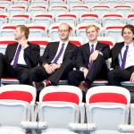 Christine & Peter Valley Ridge Golf Course wedding | Calgary Wedding Photography | groomsmen watching hockey