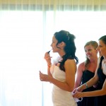 Destination wedding photographer | barcelo maya tropical resort Mexico | wedding photos | bride putting on makeup