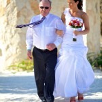 Destination wedding photographer | barcelo maya tropical resort Mexico | wedding photos | Bride walking down with dad