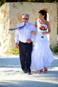 Destination wedding photographer | barcelo maya tropical resort Mexico | wedding photos | Bride walking down with dad