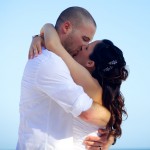 Destination wedding photographer | barcelo maya tropical resort Mexico | wedding photos | Bride and groom first kiss on the beach