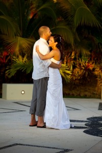 Destination wedding photographer | barcelo maya tropical resort Mexico | wedding photos | Bride and groom dancing in the sunset with palm trees