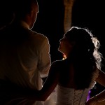 Destination wedding photographer | barcelo maya tropical resort Mexico | wedding photos | bride looking up at groom silhouette