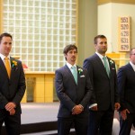 Calgary wedding photographer | Holy spirit catholic church wedding | Groomsmen at alter