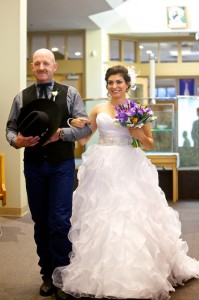 Calgary wedding photographer | Holy spirit catholic church wedding | Father of the bride walking bride down isle