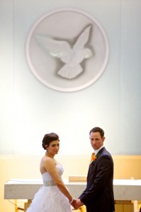 Calgary wedding photographer | Holy spirit catholic church wedding | bride and groom with dove in background