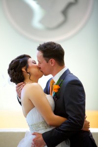 Calgary wedding photographer | Holy spirit catholic church wedding | bride and groom first kiss
