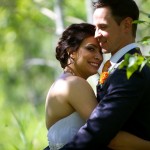 Calgary wedding photographer | Fish Creek Park wedding photos | Bride hugs and snuggles groom in birch trees