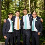 Calgary wedding photographer | Fish Creek Park wedding photos | Groom and groomsmen hanging out in trees