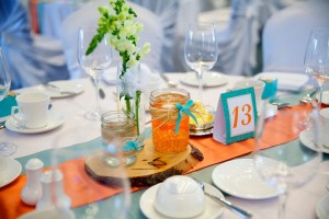 Calgary wedding photographer | Spruce Meadows wedding photos | Orange and teal centre pieces