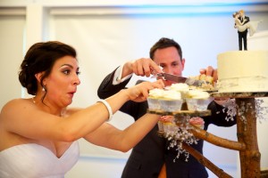 Calgary wedding photographer | Spruce Meadows wedding photos | Bride and groom cutting cake